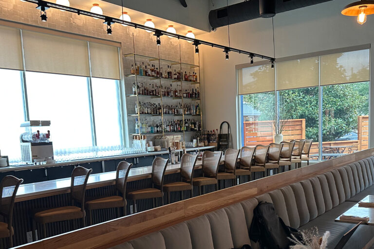 Sip & Savor II is a client we served with roller shades, interior design with drapes and textile differentiation.