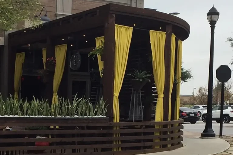 Custom drapes for a restaurant outdoor dining patio from MS Supply Co