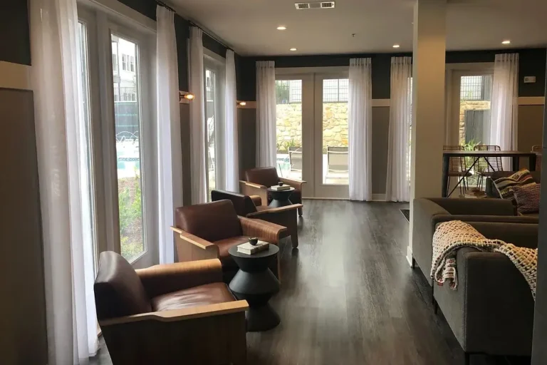 Upscale Lounge area with sheer drapes framing each window from MS Supply Co